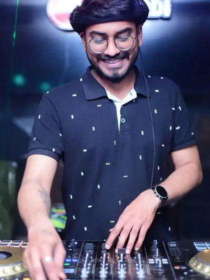 A happy moment behind the console. No matter what, I keep smiling and channel that positivity into my music to make sure everyone leaves happier.
