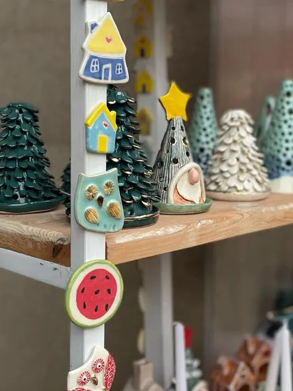 A collection of my quirky, hand-painted fridge magnets and miniature Christmas decor. I make these in small batches, featuring everything from tiny houses and owls to festive gnomes.