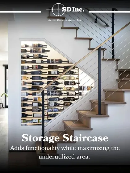 A smart storage staircase that maximizes underutilized space. This design features a built-in wine rack, turning a functional element of the home into a stylish and practical storage solution.