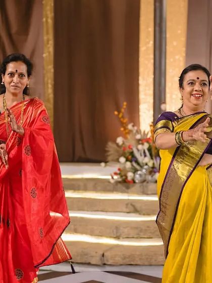 The mothers of the bride and groom performing a graceful duet. It's never too late to learn to dance and have fun on stage.