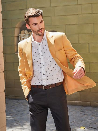 The Buttercup Yellow jacket in motion. The half-lined construction allows for a beautiful, lightweight drape that keeps you cool and stylish.