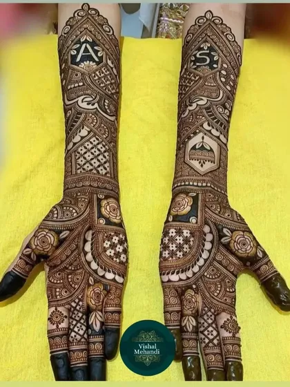 A beautiful example of incorporating initials 'A' and 'S' into a traditional design, which also features a symbol of the Golden Temple.