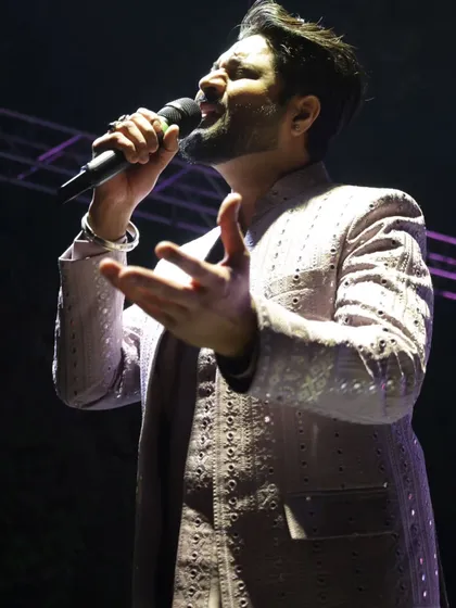 A close-up of me singing a powerful note, fully immersed in the performance.