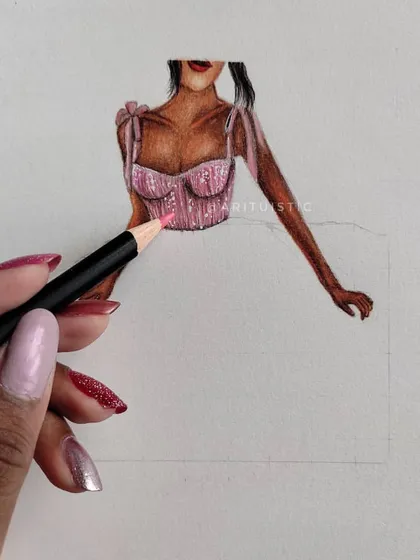 A shot of me coloring the pink dress, showing the process in action.