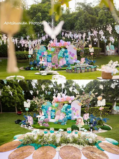 This perspective showcases the full scope of the fairyland party, from the detailed guest table in the foreground to the enchanting backdrop and hanging decorations, creating a layered and immersive environment.