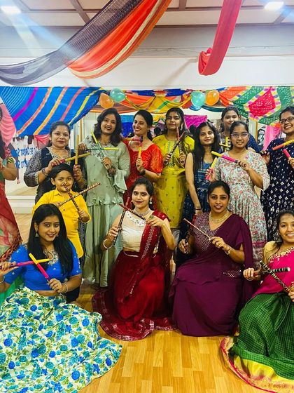 A beautiful group photo from our Dandiya event. Our members looked amazing in their traditional outfits, holding their dandiya sticks.
