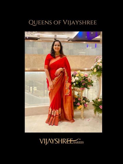 Our patron Pavithra looking elegant in a classic red saree with a beautifully detailed border.