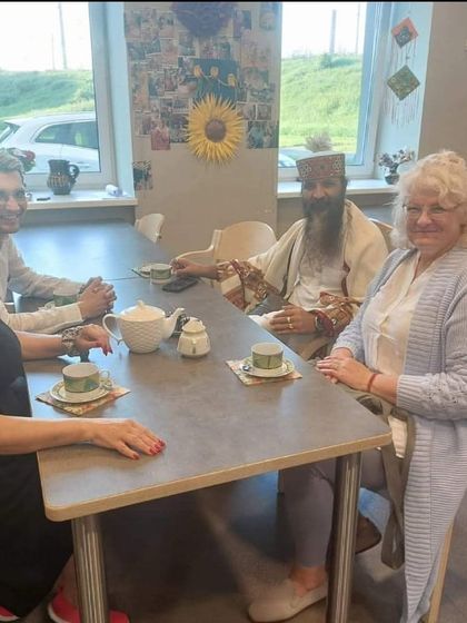 Sharing a cup of tea with friends and students in Lithuania. The most profound spiritual conversations often happen in the simplest, most relaxed settings.