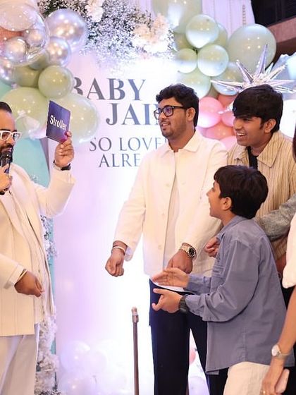 A fun quiz game in progress, hosted by a professional emcee to keep the energy high and the laughter flowing throughout the baby shower.