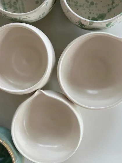 These are some of the plain white pouring bowls from the same cafe order, ready for their next stage.