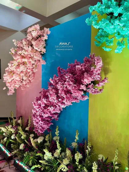 A close-up of the floral bursts on the photo wall, showcasing the beautiful pastel color palette.