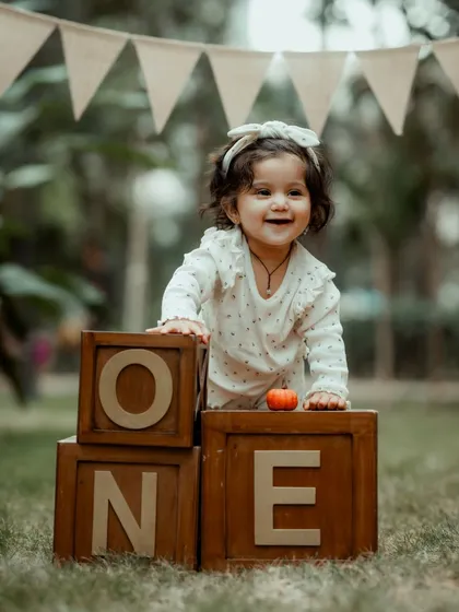 Capturing the pure, infectious joy of a first birthday. These pre-birthday shoots are all about fun and personality, creating adorable portraits that celebrate this huge milestone.