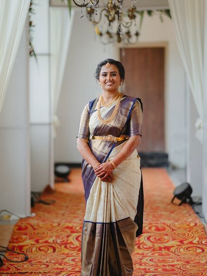 A full-length shot showing how I work with brides who are nervous about makeup to create a subtle look that makes them glow with confidence.