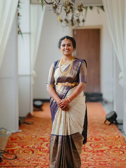 A full-length shot showing how I work with brides who are nervous about makeup to create a subtle look that makes them glow with confidence.