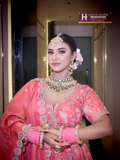 This image captures a full-length view of a modern bride. Our training covers not just makeup but also overall styling to create a complete and harmonious bridal look.