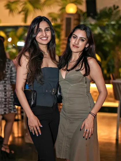 Friends enjoying the rooftop atmosphere at Pangeo.