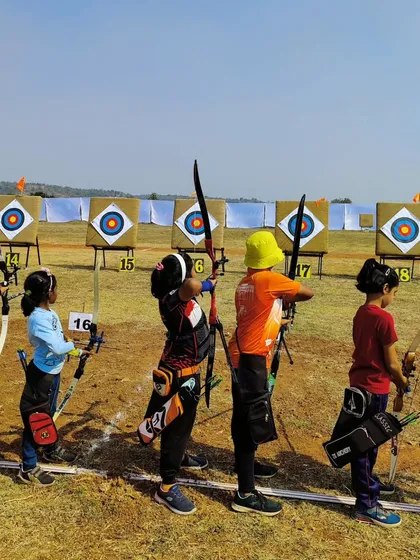 The shooting line at the 7th Under 9 State Archery Competition, filled with young, aspiring archers from across the state.