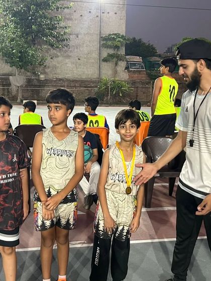 Congratulating the young players after their U-10 match. Every game is a learning opportunity, and their hard work is always acknowledged.