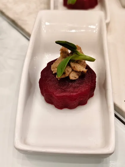 From garden to glam plate. A scalloped beetroot base carries savory toppings and is garnished with microgreens for an earthy, fresh, and impossibly elegant appetizer.