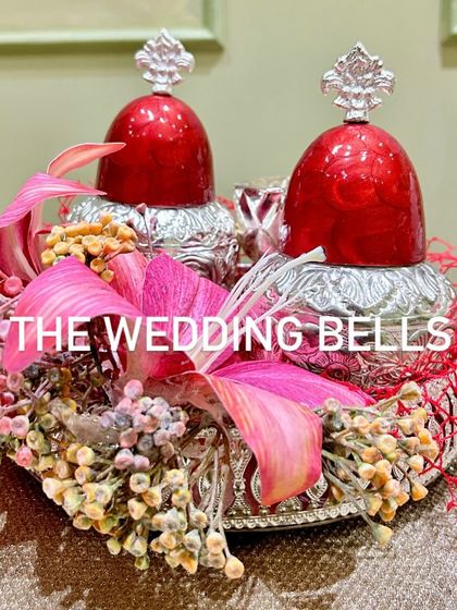 Another view of our stunning silver and pink Diwali hamper. The floral arrangement adds a pop of color to the elegant metallic base.