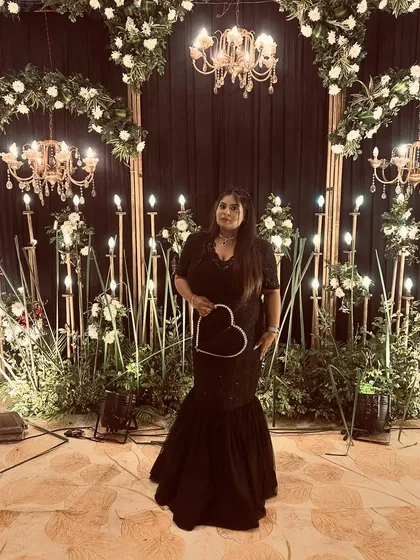 A final shot of the client in her black fish-cut gown. She looks absolutely beautiful and confident.