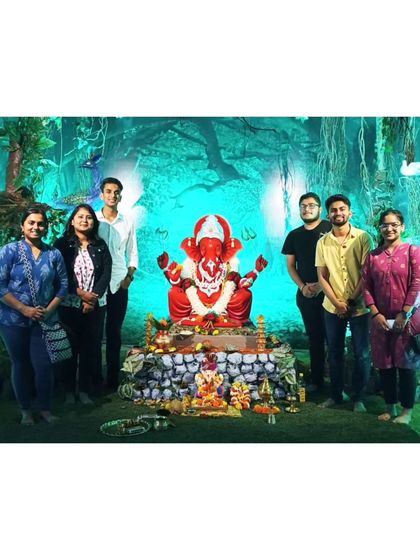 Posing with a Ganesha idol during the Ganesh Chaturthi festival season in Pune.