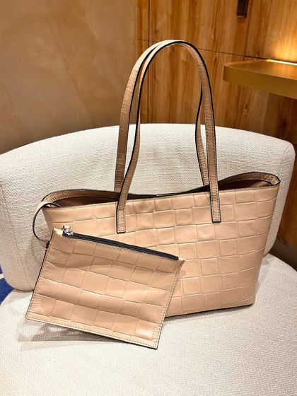 Our Basic Tote in a neutral beige checkered pattern. Perfect for those who love understated elegance, this tote is a versatile workhorse.