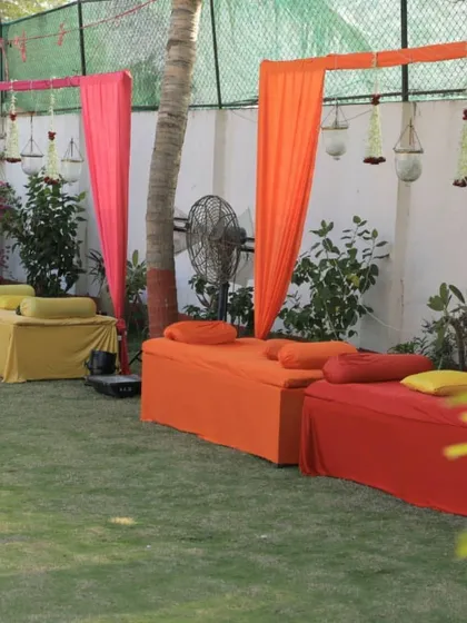 Casual and colorful seating for a Mehendi party. We used low divans in bright orange, yellow, and red, creating a relaxed and comfortable space for guests to get their henna done.