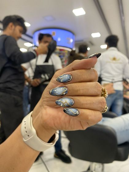 A close-up of the Korean swirls with diamond shine chrome, a popular and elegant design for any occasion.