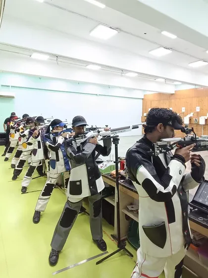 Shooters at our Vashi Centre during a preparation session, showcasing the professional environment and equipment we provide.