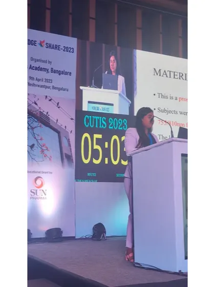 Here I am presenting my research at the KNOWLEDGE SHARE 2023 conference. I believe that staying engaged with the latest academic findings in dermatology and trichology is essential for providing the best possible care to my patients.