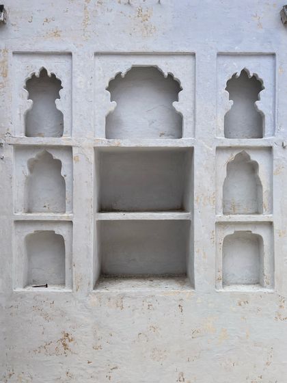 A detail of the traditional lime plaster niches, or 'taaqs', which are an integral part of haveli architecture that we carefully restore.