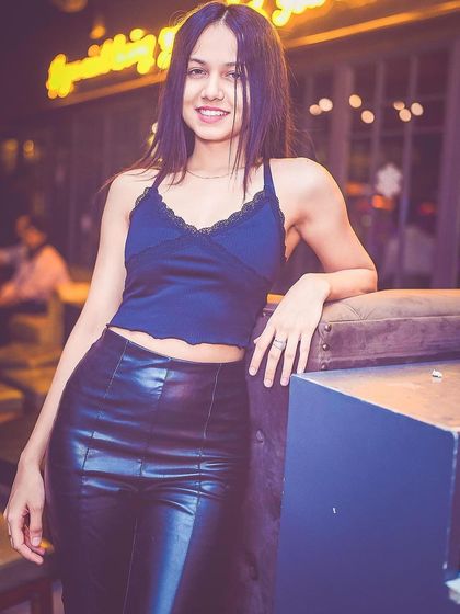 A guest posing at the bar.