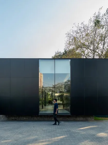 We make boxes. This completed experience center in Bangalore embodies our philosophy of stripping design down to its honest, functional soul. The result is a simple, transparent, and approachable building that stands out through its sheer simplicity.