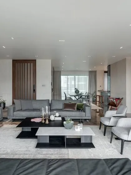 This expansive living room, designed for a young family, is divided into a large social area and an intimate family space. I believe in creating personal sanctuaries that balance timeless design with practical functionality for everyday life.