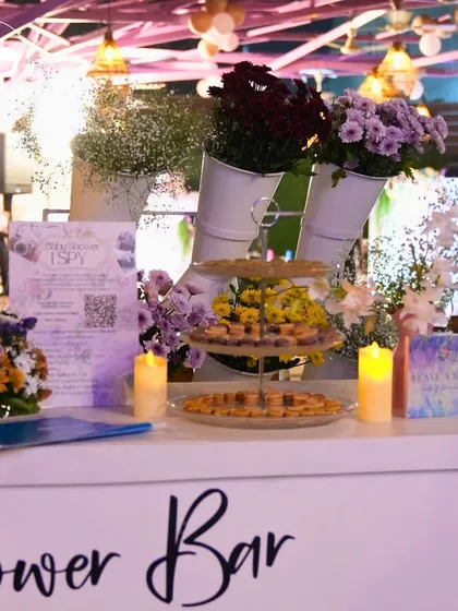 A "Flower Bar" was a highlight of the Bridgerton shower. Guests could create their own bouquets from an array of fresh flowers, adding an interactive and memorable element to the elegant affair.