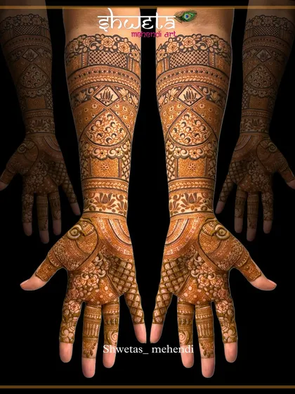 I have a deep love for traditional mehendi art. This design showcases symmetrical patterns and fine-line work, creating a full and rich look that is timeless for any celebration.