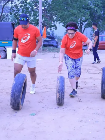 It's not just about running. Our fitness challenges, like this tire-flipping drill, are designed to build functional strength, teamwork, and grit in a fun, high-energy environment.