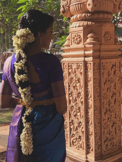 A view of the traditional jasmine-adorned bridal braid, an essential part of the South Indian bridal look that I love creating.