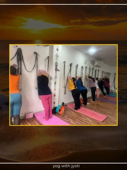 A line of students using the wall to get a deep and effective shoulder stretch.