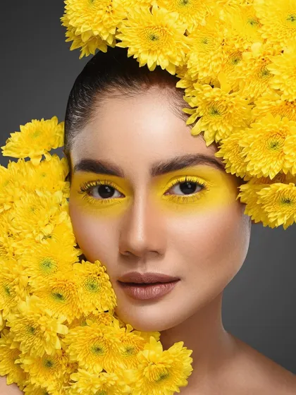 I love collaborating with makeup artists to push creative boundaries. This editorial portrait uses a monochromatic color scheme, matching the floral styling with the makeup to create a striking and high fashion beauty shot.