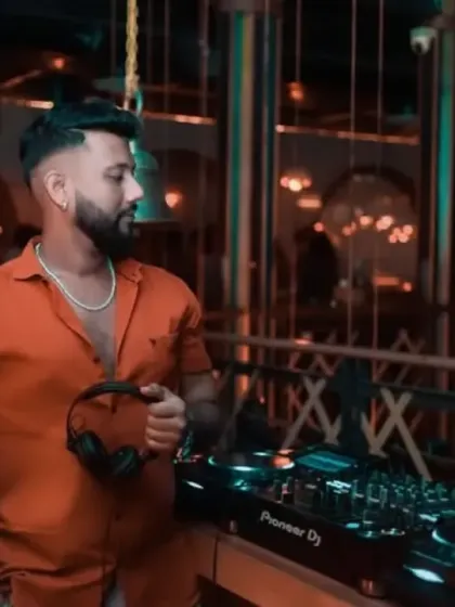 Chillin' like a villain. A candid moment before the party kicks into high gear.