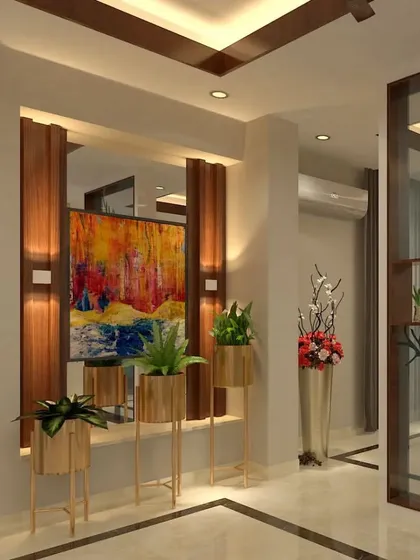 An elegant entryway featuring artistic planters and a vibrant painting. This space serves as a beautiful transition into the main living area, setting a warm and welcoming tone.