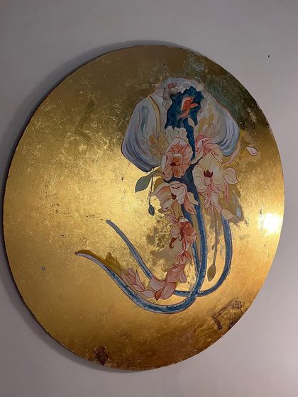 The jellyfish begins to take form with layers of paint. I blended floral elements into its tentacles, imagining it as a floating bouquet from a surreal underwater garden.