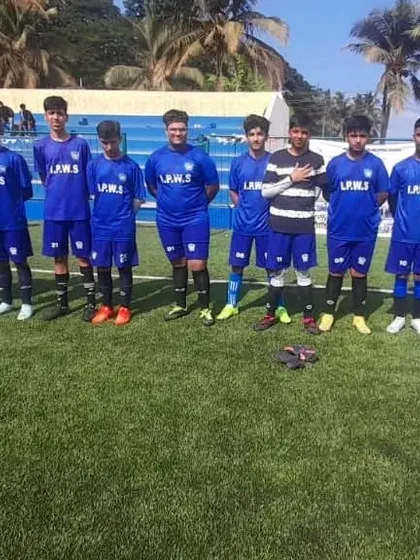 The team lined up for a pre-match photograph during the Goa tournament. Playing on different grounds against new opponents is a key part of their development.