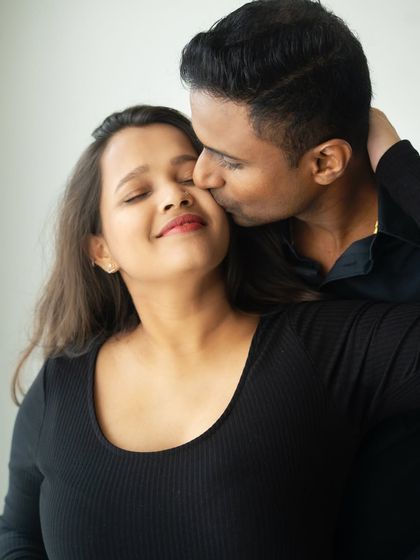 A gentle kiss on the cheek, a moment of pure affection. I focus on capturing these small, tender gestures that reveal the deep love between a couple.