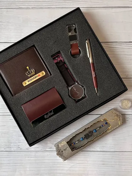 This is my go-to gift set for men. It features a personalized wallet and cardholder, a watch, a pen, and a rakhi, all neatly arranged in a premium gift box, making it a perfect and complete present for any occasion.