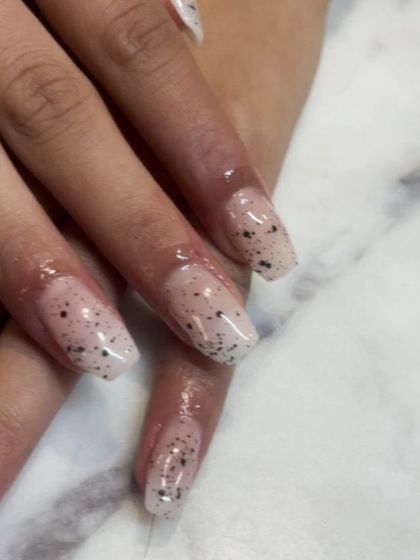 This shot shows the beautiful shape and clarity of the extensions, providing the perfect canvas for any nail art.