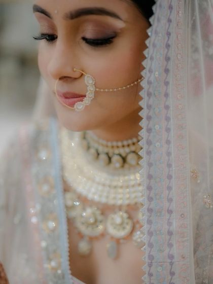 Another close-up showing the delicate nath and the soft, blended eye makeup. It's all about subtle, beautiful details.