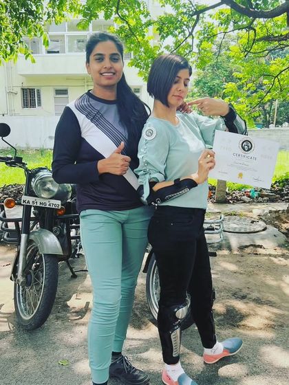 A coach and graduate celebrate together. This partnership is at the heart of our success.